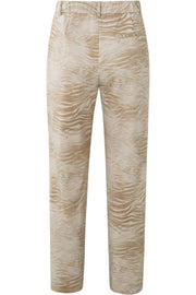 Pantalón de punto con bolsillos laterales, cremallera y animal print
